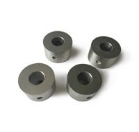 Tungsten carbide choke and trim
